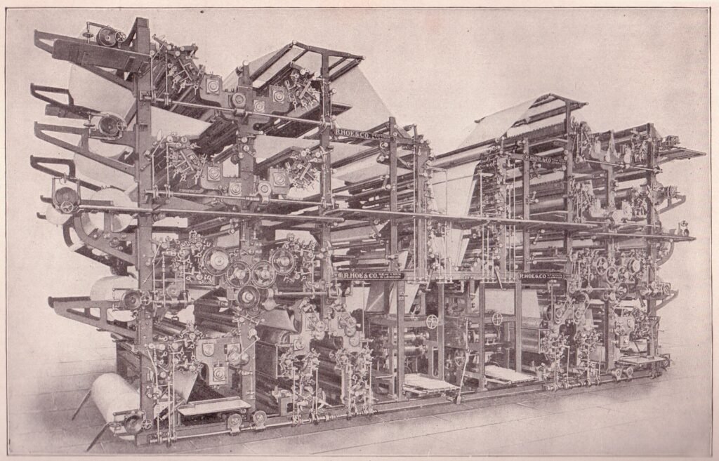 A double octuple newspaper press, built to print large runs at speed.