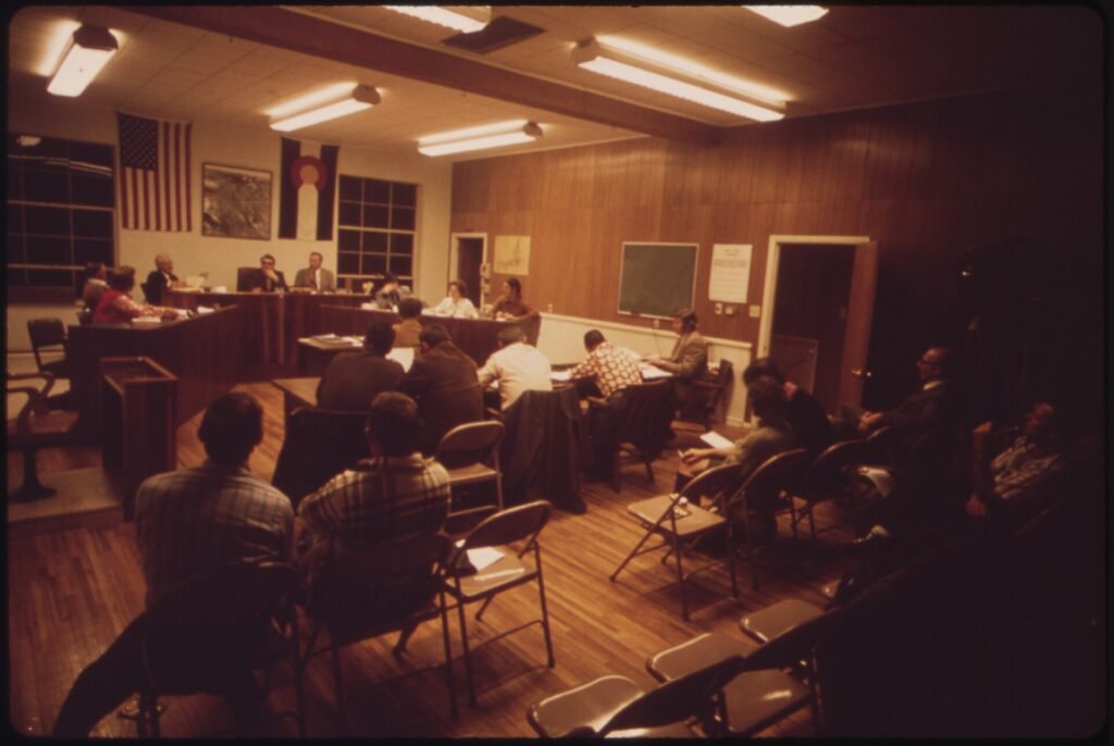 A city council meeting. Local councils make many of the decisions that shape daily life.